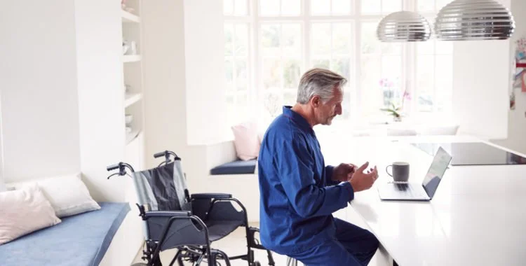 Man searching internet for a personal injury attorney.